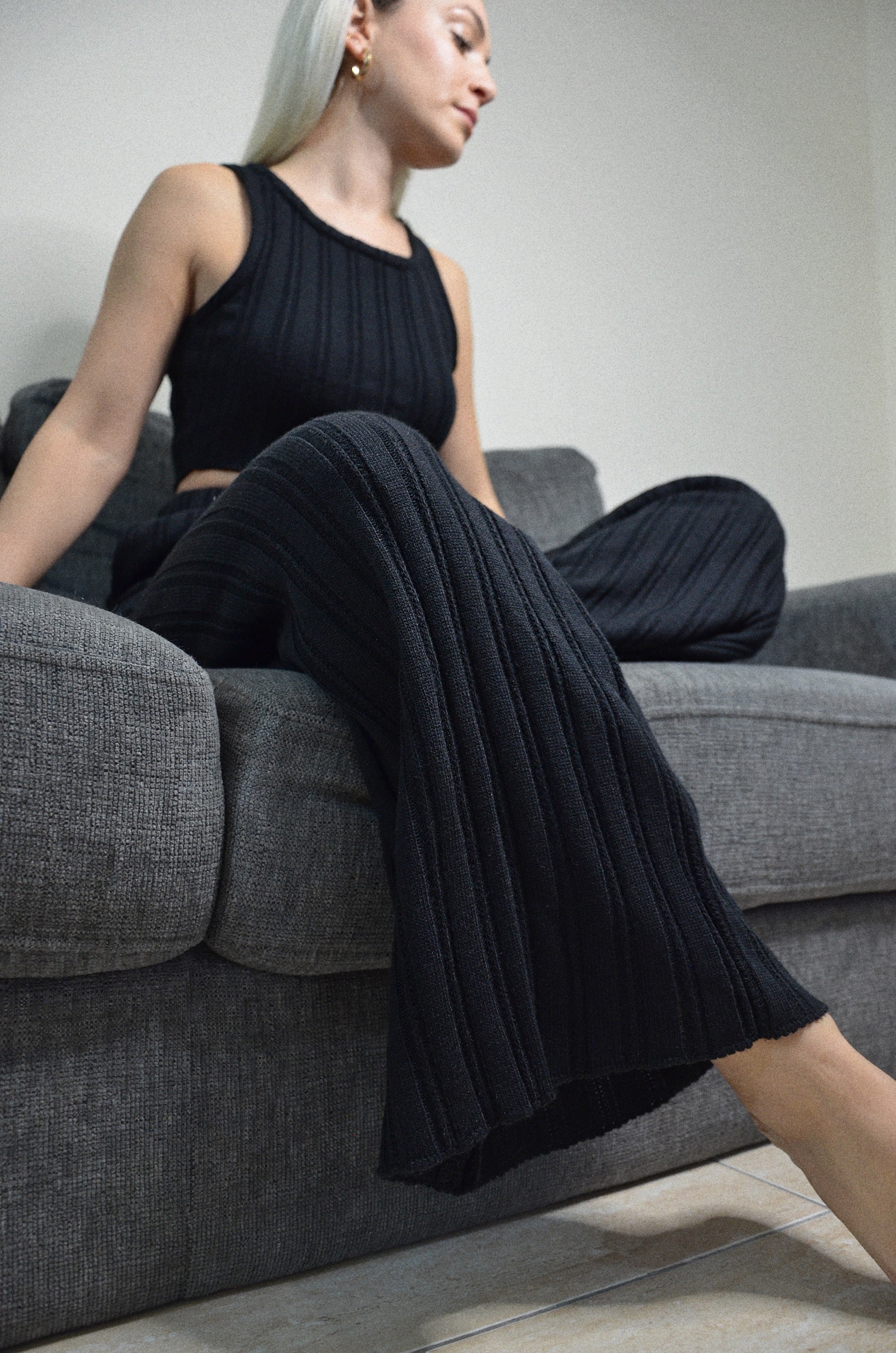 loungewear knit pants, side, texture, black colour, close up , rip knit